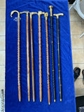 Walking Stick with various brass tops